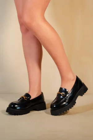 MURIEL CHUNKY SOLE SLIP ON LOAFERS WITH METAL DETAIL IN BLACK HIGH SHINE